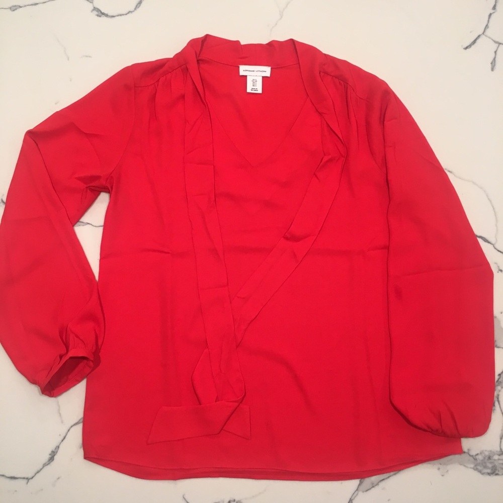 Red flowy blouse with tie collar